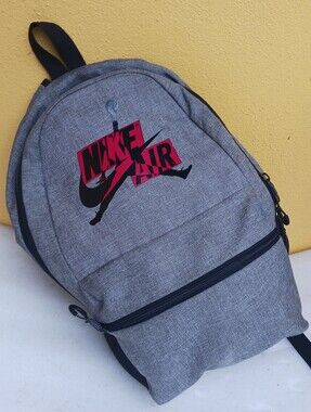 Nike Grey Backpack with Red and Black Nike Air Logo